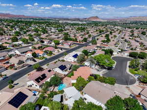 Aerial view of residential area with a mountain backdrop