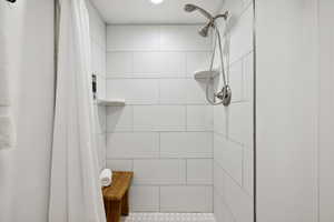 Bathroom with tiled shower