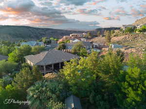 View of property location with a mountain backdrop and nearby suburban area