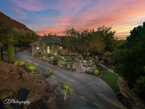 View of front of house featuring a mountain view and stairs