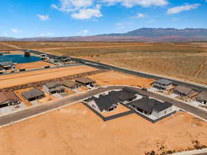 Bird's eye view of a mountainous background and a desert landscape