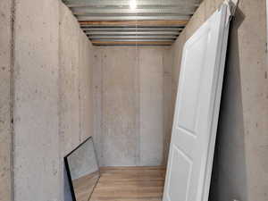 Below grade area featuring wood finished floors
