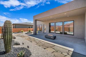 View of patio / terrace with an outdoor fire pit