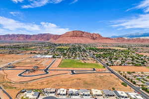 Aerial view of residential area featuring mountains