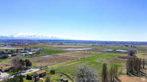 View of property location with rural landscape and mountains