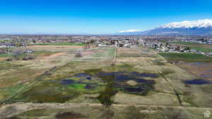 Aerial view of property's location with a mountain backdrop