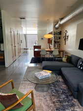 Living room with finished concrete flooring