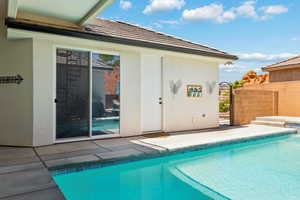 View of swimming pool with a patio area