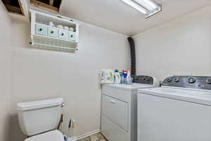 Laundry area with separate washer and dryer