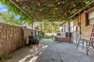 View of patio featuring a pergola