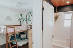 Bedroom featuring wood finished floors and recessed lighting