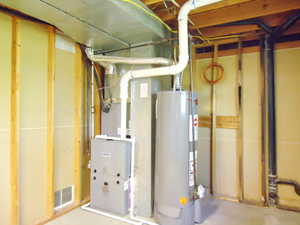 One-year old furnace and central A/C. Water heater app. 4 years old.