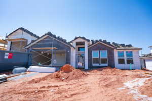 Unfinished property featuring a tiled roof