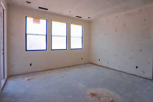Empty room featuring healthy amount of natural light