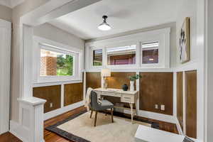 Home office featuring wood finished floors