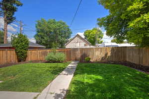 View of fenced backyard