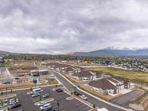 Aerial perspective of suburban area with a mountain backdrop