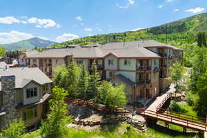 Aerial view of residential area with a mountainous background