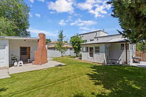 View of yard with a patio area