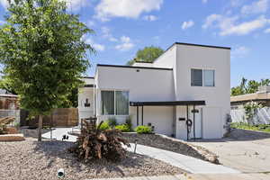 View of front of home featuring stucco siding