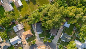 Aerial view of property's location with nearby suburban area