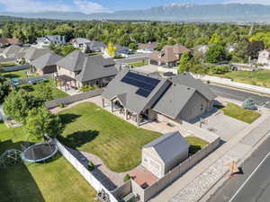 Aerial view of residential area featuring mountains
