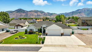 View of mountain background featuring nearby suburban area