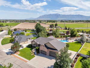 Drone / aerial view of mountains and a pool area