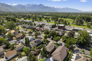 Aerial perspective of suburban area with a mountainous background