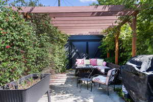 View of patio with a pergola