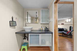 Bathroom with vanity, shower, and toilet