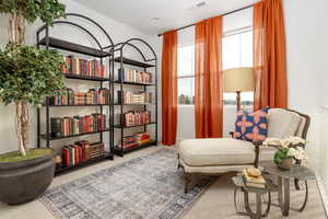 Living area with carpet floors