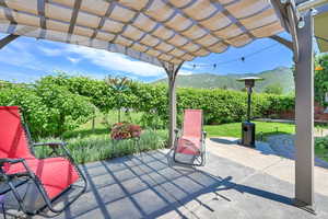 View of patio / terrace featuring a mountain view and a pergola