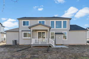 Rear view of property featuring stucco siding and a patio