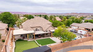 Aerial view of residential area featuring mountains