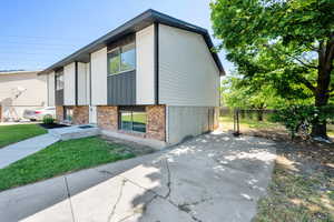 View of home's exterior with brick siding