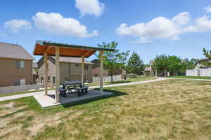 View of yard with a gazebo, a patio area, and a residential view