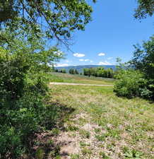 View of yard with a view of countryside