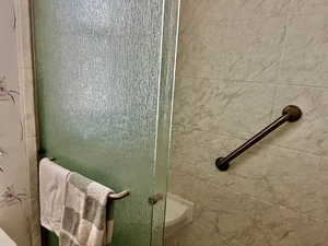 Full bathroom with a shower