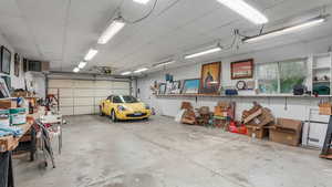 Garage with a garage door opener and a heating unit