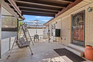 View of patio featuring outdoor dining area