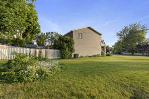 View of yard featuring central AC