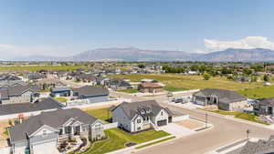 Aerial perspective of suburban area featuring mountains