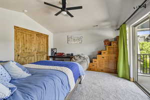 Bedroom with lofted ceiling, carpet, access to exterior, and ceiling fan