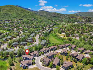 Aerial perspective of suburban area featuring mountains