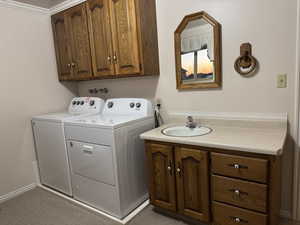 Washroom with washing machine and dryer and cabinet space
