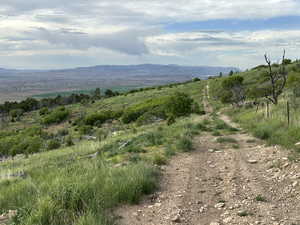 View of mountain background featuring rural landscape