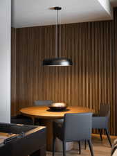 Dining area with wood finished floors