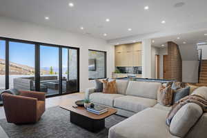 Living room with light wood-type flooring, recessed lighting, and billiards