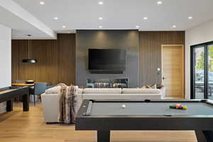 Game room featuring billiards, recessed lighting, light wood-type flooring, and an accent wall